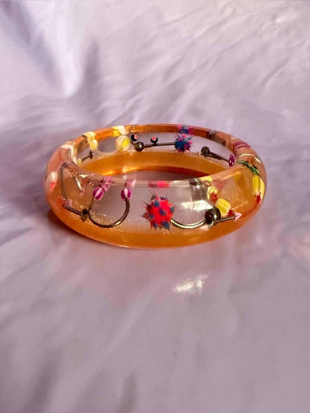Orange piercing bangle - Picture 2 of 3